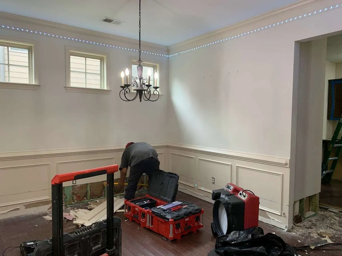 Restoration technician with professional equipment in Lyndhurst